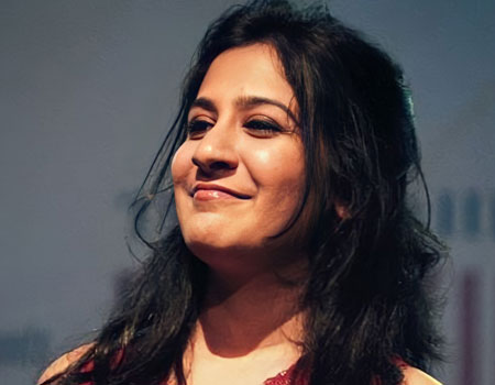 singer Shweta Mohen smiling