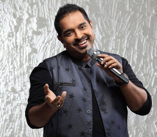 National SInger Shankar Mahadevan with mike
